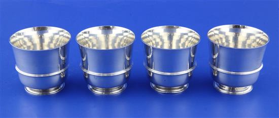 A set of four 20th century American? sterling silver tumbler cups, 15 oz.